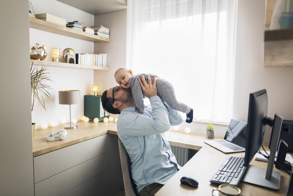 father-working-from-home-with-baby.jpg